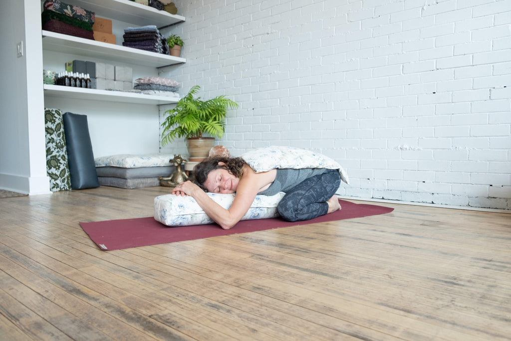 How a Bolster Enhances Restorative Yoga - Love My Mat