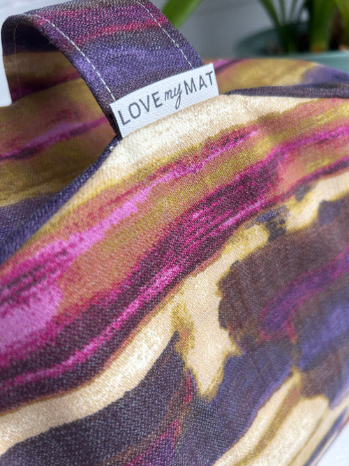 Colorful meditation cushion with a 'LOVE my MAT' label