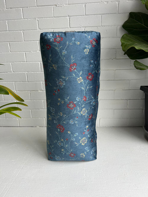 Blue velvet material Yoga Bolster on white background