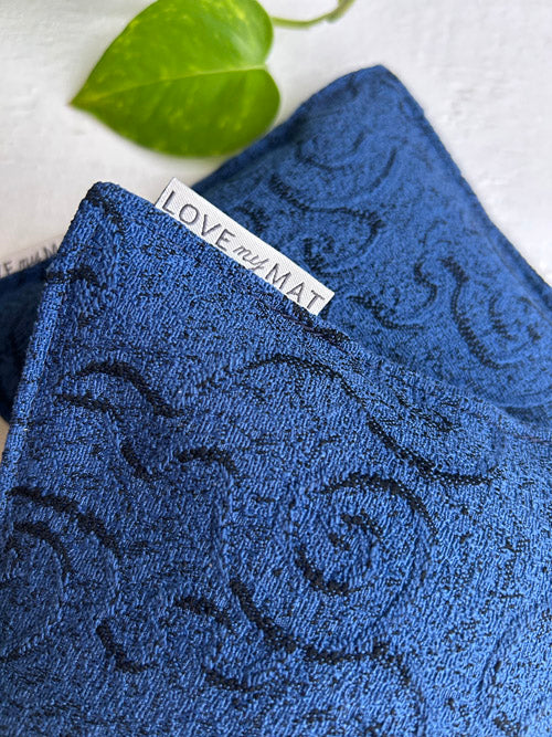 Blue textured yoga knee pillows with 'LOVE my MAT' tag on a light background