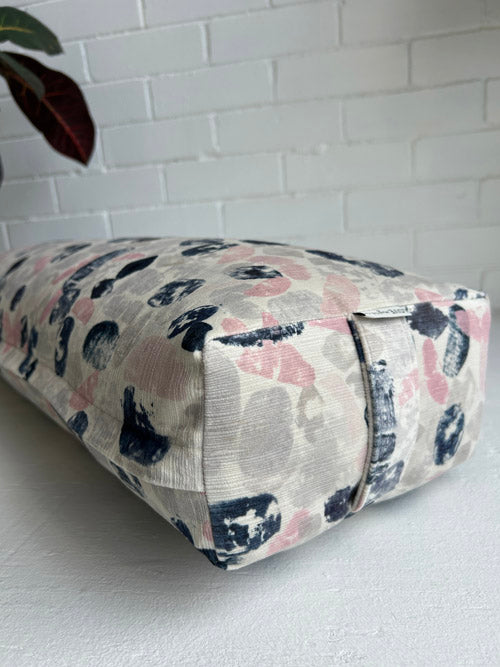 Abstract Yoga Bolster with pattern on a white surface