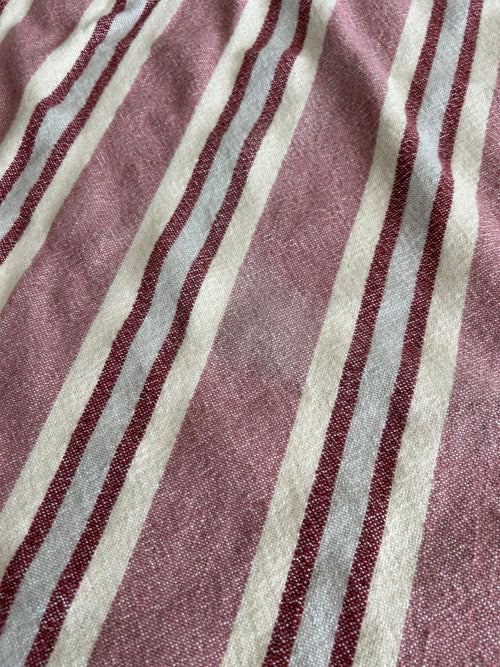 Close-up of striped fabric with red and beige lines