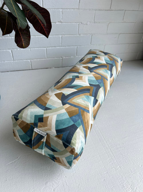 Yoga Bolster with geometric pattern on a white surface