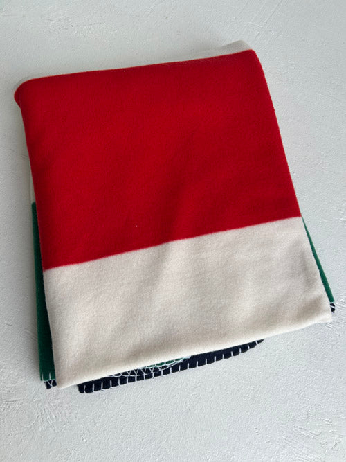 Red and white blanket on a white background