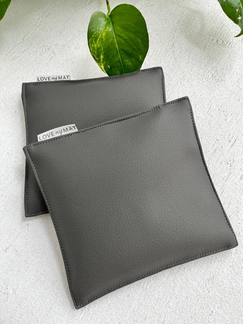 Pair of Knee Pillows covered in wipeable vinyl and filled with flax seeds