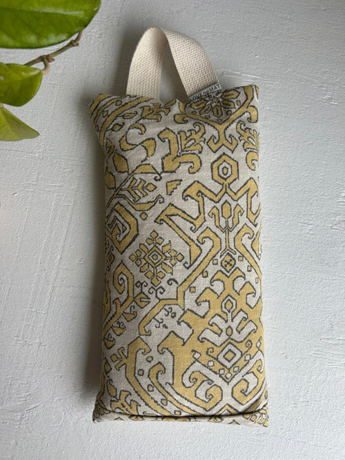 Fabric 10lbs sandbag with geometric pattern on a light gray background